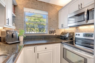 Stunning Corner Unit Condo - Fully Furnished & Move-In on Hillsboro Pines Golf in Florida - for sale on GolfHomes.com, golf home, golf lot