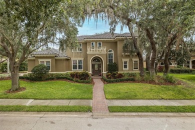 CHAMPIONS CLUB Luxury Bayfair Custom built home tucked behind on Fox Hollow Golf Club in Florida - for sale on GolfHomes.com, golf home, golf lot