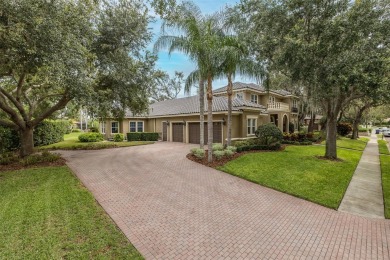 CHAMPIONS CLUB Luxury Bayfair Custom built home tucked behind on Fox Hollow Golf Club in Florida - for sale on GolfHomes.com, golf home, golf lot