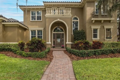 CHAMPIONS CLUB Luxury Bayfair Custom built home tucked behind on Fox Hollow Golf Club in Florida - for sale on GolfHomes.com, golf home, golf lot