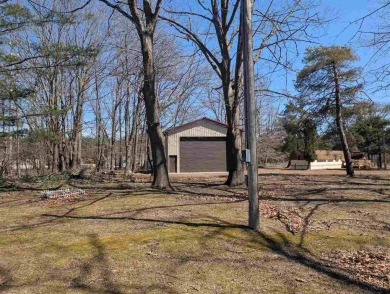 Pole Barn overlooking the 6th fairway of the Charlevoix Public on Charlevoix Golf Club in Michigan - for sale on GolfHomes.com, golf home, golf lot