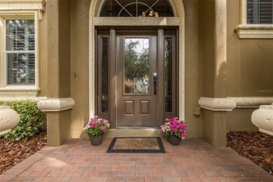 CHAMPIONS CLUB Luxury Bayfair Custom built home tucked behind on Fox Hollow Golf Club in Florida - for sale on GolfHomes.com, golf home, golf lot
