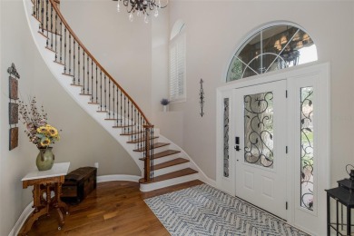 CHAMPIONS CLUB Luxury Bayfair Custom built home tucked behind on Fox Hollow Golf Club in Florida - for sale on GolfHomes.com, golf home, golf lot