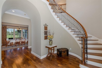 CHAMPIONS CLUB Luxury Bayfair Custom built home tucked behind on Fox Hollow Golf Club in Florida - for sale on GolfHomes.com, golf home, golf lot