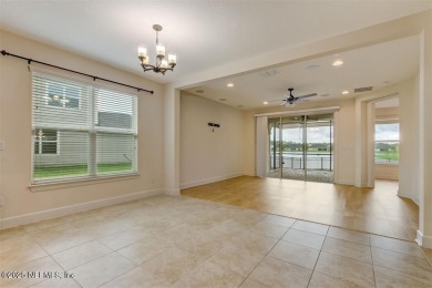 WATERFRONT LUXURY in Amelia Walk! Perfectly positioned on a on Golf Club At North Hampton in Florida - for sale on GolfHomes.com, golf home, golf lot