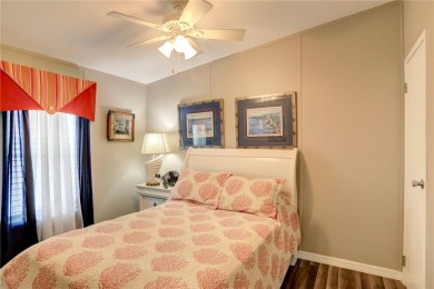 2002 Perimeter lot home. With 3-bed, 2-bath featuring desirable on Barefoot Bay Golf Course in Florida - for sale on GolfHomes.com, golf home, golf lot