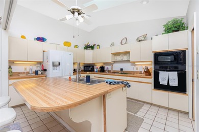 Welcome to 204 Bunker Rd, a rare opportunity to own a pool home on Rotonda Golf and Country Club The Palms Course in Florida - for sale on GolfHomes.com, golf home, golf lot