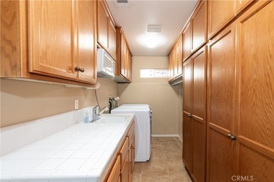 Perched above the greens with sweeping 180-degree golf course on  in California - for sale on GolfHomes.com, golf home, golf lot