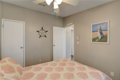 2002 Perimeter lot home. With 3-bed, 2-bath featuring desirable on Barefoot Bay Golf Course in Florida - for sale on GolfHomes.com, golf home, golf lot