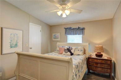 2002 Perimeter lot home. With 3-bed, 2-bath featuring desirable on Barefoot Bay Golf Course in Florida - for sale on GolfHomes.com, golf home, golf lot