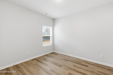 This thoughtfully designed Escape floor plan combines style and on Harbour Point Golf Club in North Carolina - for sale on GolfHomes.com, golf home, golf lot