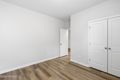 This thoughtfully designed Escape floor plan combines style and on Harbour Point Golf Club in North Carolina - for sale on GolfHomes.com, golf home, golf lot