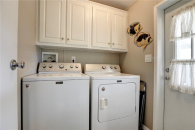 2002 Perimeter lot home. With 3-bed, 2-bath featuring desirable on Barefoot Bay Golf Course in Florida - for sale on GolfHomes.com, golf home, golf lot