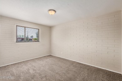 Fantastic opportunity to own this charming single-level home! on Maryvale Golf Course in Arizona - for sale on GolfHomes.com, golf home, golf lot