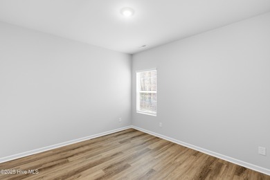 This thoughtfully designed Escape floor plan combines style and on Harbour Point Golf Club in North Carolina - for sale on GolfHomes.com, golf home, golf lot