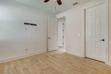 WATERFRONT LUXURY in Amelia Walk! Perfectly positioned on a on Golf Club At North Hampton in Florida - for sale on GolfHomes.com, golf home, golf lot
