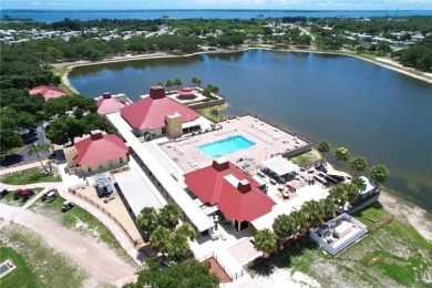 2002 Perimeter lot home. With 3-bed, 2-bath featuring desirable on Barefoot Bay Golf Course in Florida - for sale on GolfHomes.com, golf home, golf lot