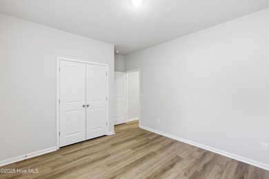 This thoughtfully designed Escape floor plan combines style and on Harbour Point Golf Club in North Carolina - for sale on GolfHomes.com, golf home, golf lot