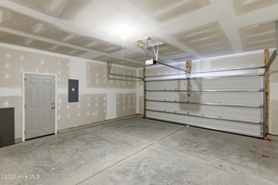 This thoughtfully designed Escape floor plan combines style and on Harbour Point Golf Club in North Carolina - for sale on GolfHomes.com, golf home, golf lot