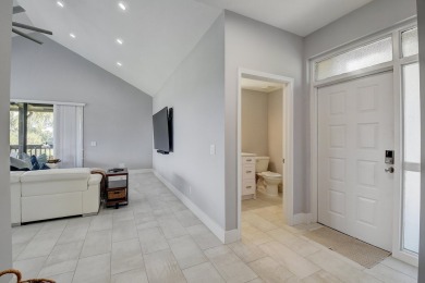 Sabal Lake totally renovated 2nd floor 1 bedroom, 1.5 bath on Boca West Golf and Country Club in Florida - for sale on GolfHomes.com, golf home, golf lot