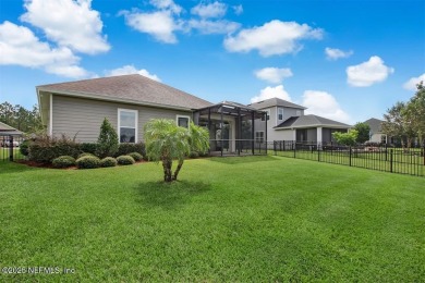 WATERFRONT LUXURY in Amelia Walk! Perfectly positioned on a on Golf Club At North Hampton in Florida - for sale on GolfHomes.com, golf home, golf lot
