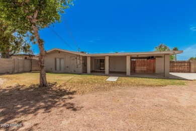 Fantastic opportunity to own this charming single-level home! on Maryvale Golf Course in Arizona - for sale on GolfHomes.com, golf home, golf lot