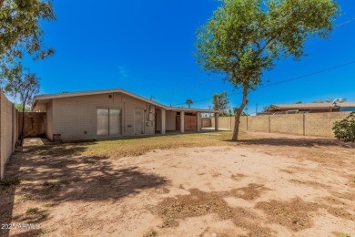 Fantastic opportunity to own this charming single-level home! on Maryvale Golf Course in Arizona - for sale on GolfHomes.com, golf home, golf lot