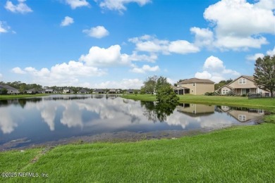 WATERFRONT LUXURY in Amelia Walk! Perfectly positioned on a on Golf Club At North Hampton in Florida - for sale on GolfHomes.com, golf home, golf lot