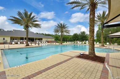 WATERFRONT LUXURY in Amelia Walk! Perfectly positioned on a on Golf Club At North Hampton in Florida - for sale on GolfHomes.com, golf home, golf lot