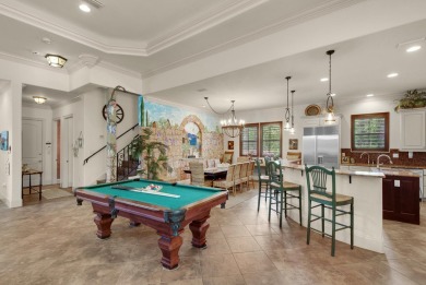 This impeccable Mediterranean home is located at the end of a on Regatta Bay Golf and Country Club in Florida - for sale on GolfHomes.com, golf home, golf lot