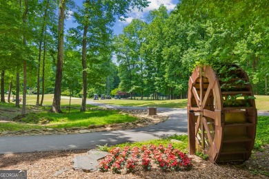 Escape to the mountain retreat in this gated community of Bent on Bent Tree Golf Course in Georgia - for sale on GolfHomes.com, golf home, golf lot
