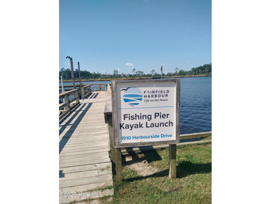 This thoughtfully designed Escape floor plan combines style and on Harbour Point Golf Club in North Carolina - for sale on GolfHomes.com, golf home, golf lot