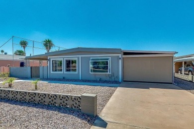 Come and explore this charming, updated home in Mesa! Nestled on on Desert Sands Golf Course in Arizona - for sale on GolfHomes.com, golf home, golf lot