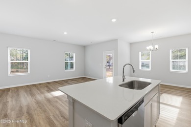 This thoughtfully designed Escape floor plan combines style and on Harbour Point Golf Club in North Carolina - for sale on GolfHomes.com, golf home, golf lot