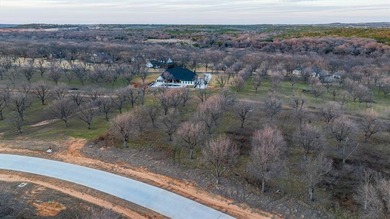 Treed 1.5 acre lot in The Landings East at Pecan Plantation on Pecan Plantation Country Club in Texas - for sale on GolfHomes.com, golf home, golf lot
