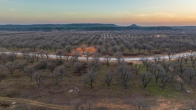 Treed 1.5 acre lot in The Landings East at Pecan Plantation on Pecan Plantation Country Club in Texas - for sale on GolfHomes.com, golf home, golf lot