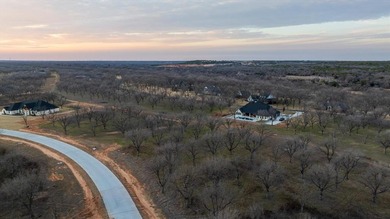 Treed 1.5 acre lot in The Landings East at Pecan Plantation on Pecan Plantation Country Club in Texas - for sale on GolfHomes.com, golf home, golf lot