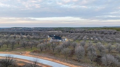 Treed 1.5 acre lot in The Landings East at Pecan Plantation on Pecan Plantation Country Club in Texas - for sale on GolfHomes.com, golf home, golf lot