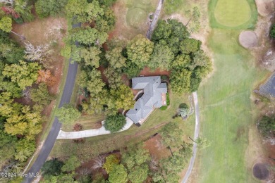 Location, location, location! This stunning, custom home sits on on Lockwood Folly Country Club in North Carolina - for sale on GolfHomes.com, golf home, golf lot