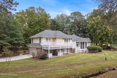 Location, location, location! This stunning, custom home sits on on Lockwood Folly Country Club in North Carolina - for sale on GolfHomes.com, golf home, golf lot