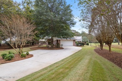 Location, location, location! This stunning, custom home sits on on Lockwood Folly Country Club in North Carolina - for sale on GolfHomes.com, golf home, golf lot