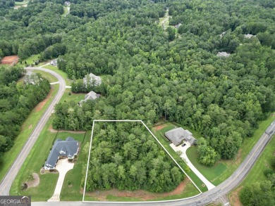 Build your dream home on this beautiful 1.10-acre lot located in on The Club River Forest in Georgia - for sale on GolfHomes.com, golf home, golf lot