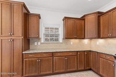 Beautifully built by Trusst, this freshly painted townhome is on Cape Fear National At Brunswick Forest in North Carolina - for sale on GolfHomes.com, golf home, golf lot