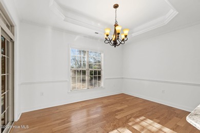 Beautifully built by Trusst, this freshly painted townhome is on Cape Fear National At Brunswick Forest in North Carolina - for sale on GolfHomes.com, golf home, golf lot