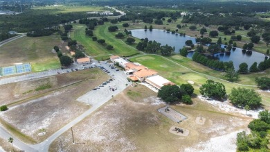 Located in a beautiful gated community, this property offers on Indian Lake Estates Golf and Country Club in Florida - for sale on GolfHomes.com, golf home, golf lot