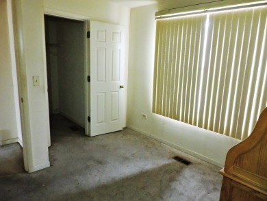 **HANDYMAN SPECIAL** Rarely available 3-level Townhome in gated on South Shore Cultural Ctr. Golf Course in Illinois - for sale on GolfHomes.com, golf home, golf lot