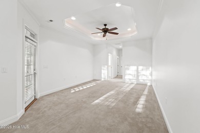 Beautifully built by Trusst, this freshly painted townhome is on Cape Fear National At Brunswick Forest in North Carolina - for sale on GolfHomes.com, golf home, golf lot