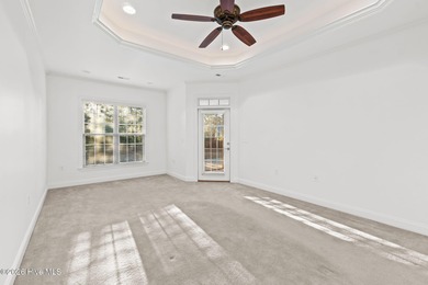 Beautifully built by Trusst, this freshly painted townhome is on Cape Fear National At Brunswick Forest in North Carolina - for sale on GolfHomes.com, golf home, golf lot