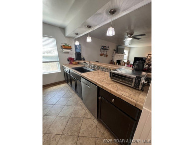 Exclusive Community Living in Cutter Place! Enjoy the on The Oaks Golf Course in Missouri - for sale on GolfHomes.com, golf home, golf lot