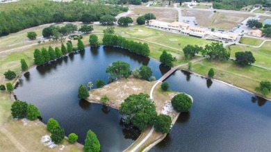 Located in a beautiful gated community, this property offers on Indian Lake Estates Golf and Country Club in Florida - for sale on GolfHomes.com, golf home, golf lot